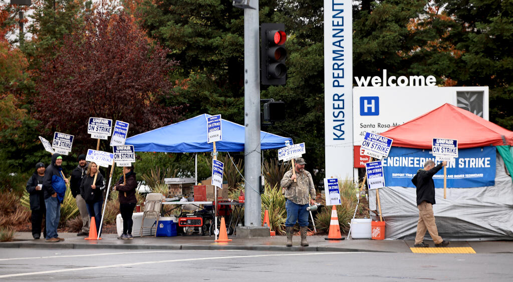 Kaiser Permanente engineers and those in solidarity with the union, picket, Wednesday, October 21, 2021 at the corner of Mendocino Ave. and Bicentennial Way in Santa Rosa. (Kent Porter / The Press Democrat) 2021