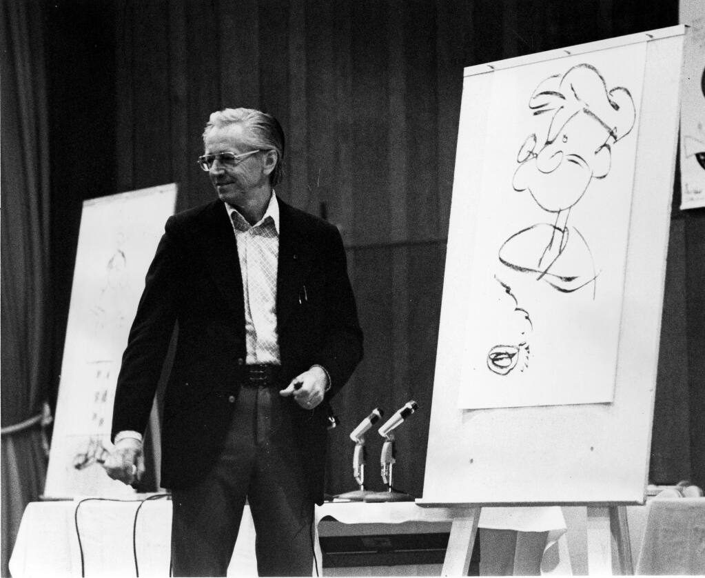 Charles Schulz stands next to his rendition of Popeye at the 1974 San Diego Comic-Con. (Charles M. Schulz Museum & Research Center.)