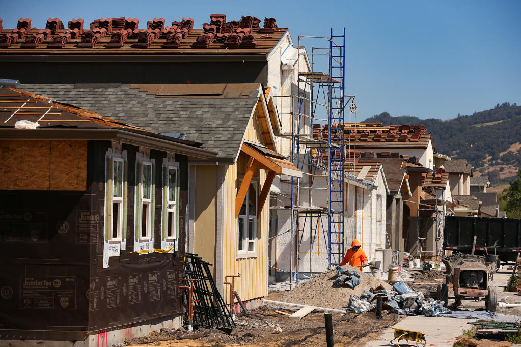 Construction work continues on the Sycamore development by Signature Homes in Rohnert Park on Tuesday, May 11, 2021.  (Christopher Chung/ The Press Democrat)