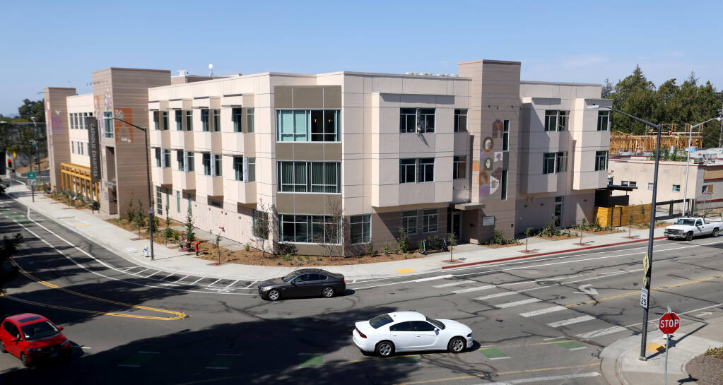 Cars drive by the newly built Caritas Center Wednesday, Sept. 7, 2022, in Santa Rosa. (Beth Schlanker/The Press Democrat)