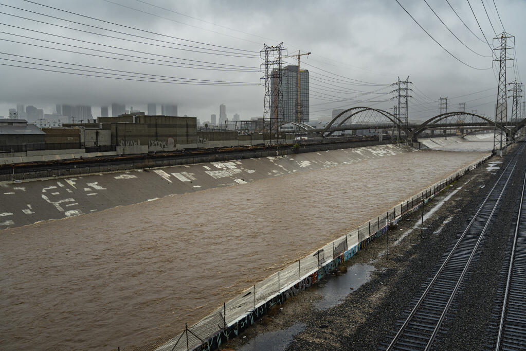 The Los Angeles River after a day of heavy rain on Feb. 5, 2024. Photo by Jules Hotz for CalMatters