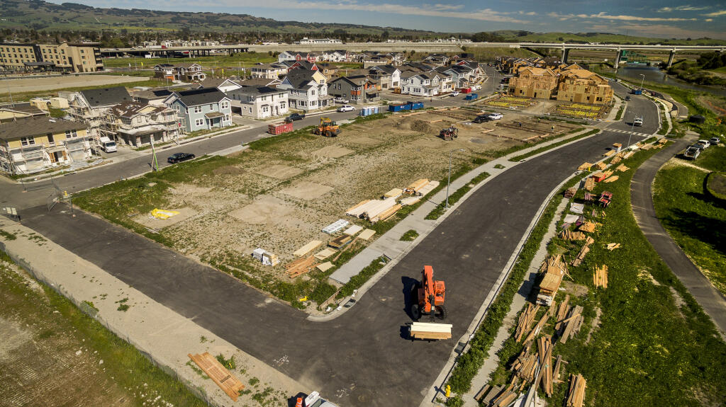 Construction continues on the planned Riverfront development at the end of Caulfield lane in south Petaluma on Tuesday, March 8, 2022. (CHAD SURMICK/THE PRESS DEMOCRAT)