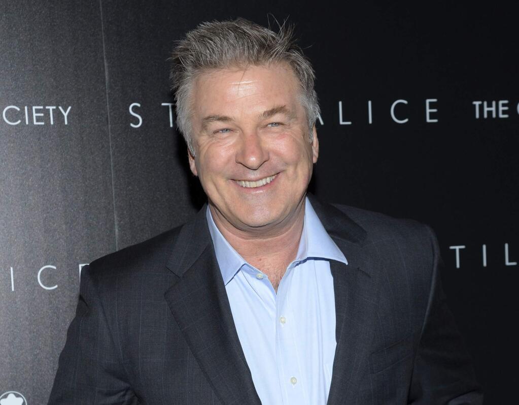 FILE - In this Jan. 13, 2015 file photo, actor Alec Baldwin attends a special screening of his film 'Still Alice' in New York. No debating: Baldwin stole the show Saturday, Oct. 1, 2016, in his new role as Donald Trump when 'Saturday Night Live' spoofed the recent presidential debate. Facing off against Kate McKinnon as she impersonated Democratic hopeful Hillary Clinton, Baldwin delivered an orange-faced, blustery impression as her GOP rival. (Photo by Evan Agostini/Invision/AP, File)