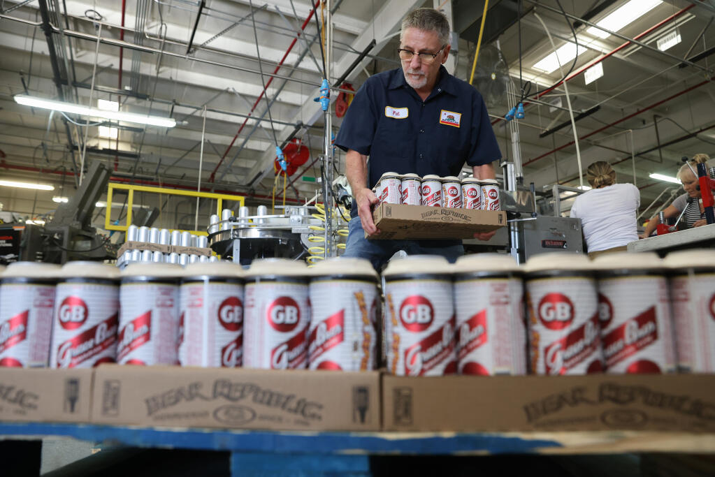 Pat Reece loads a pallet with Bear Republic Grace Bros. Bavarian type beer in Cloverdale Thursday, September 15, 2022.  (Christopher Chung/The Press Democrat)