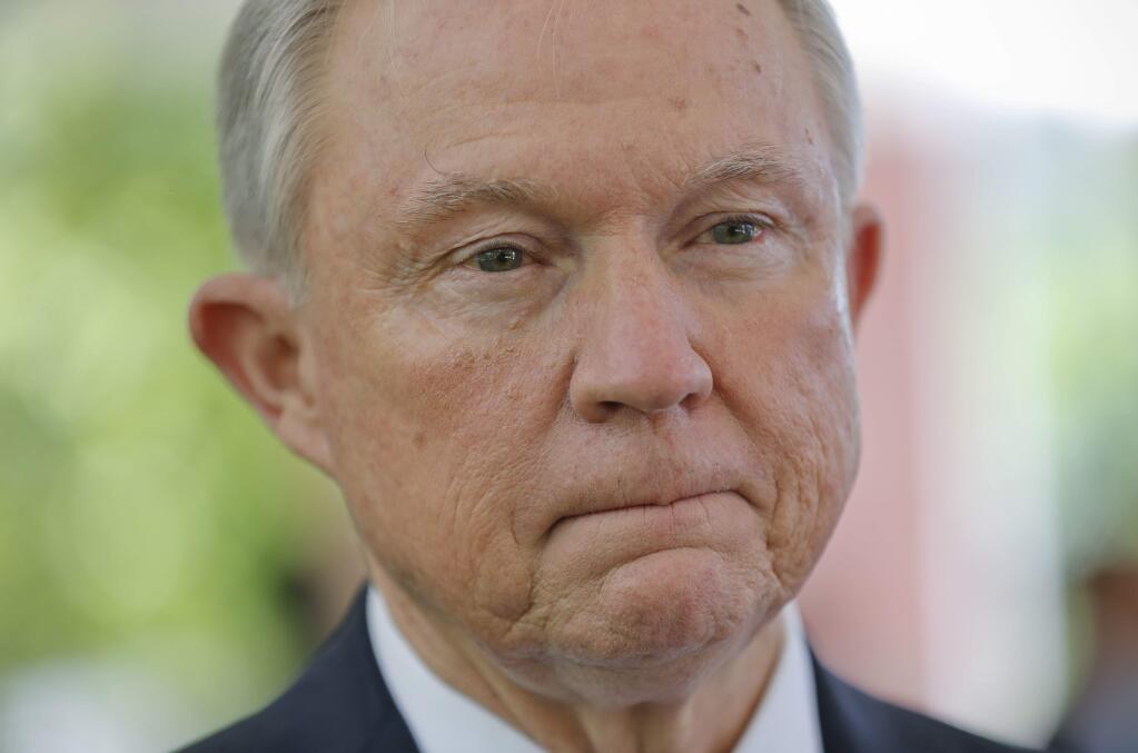 U.S. Attorney General Jeff Sessions pauses as he answers questions during his interview with the Associated Press at the U.S. Embassy in San Salvador, El Salvador, Thursday, July 27, 2017. Sessions is forging ahead with a tough-on-crime agenda that once endeared him to President Trump, who has since taken to berating him. Sessions is in El Salvador to step up international cooperation against the violent street gang MS-13. (AP Photo/Pablo Martinez Monsivais)