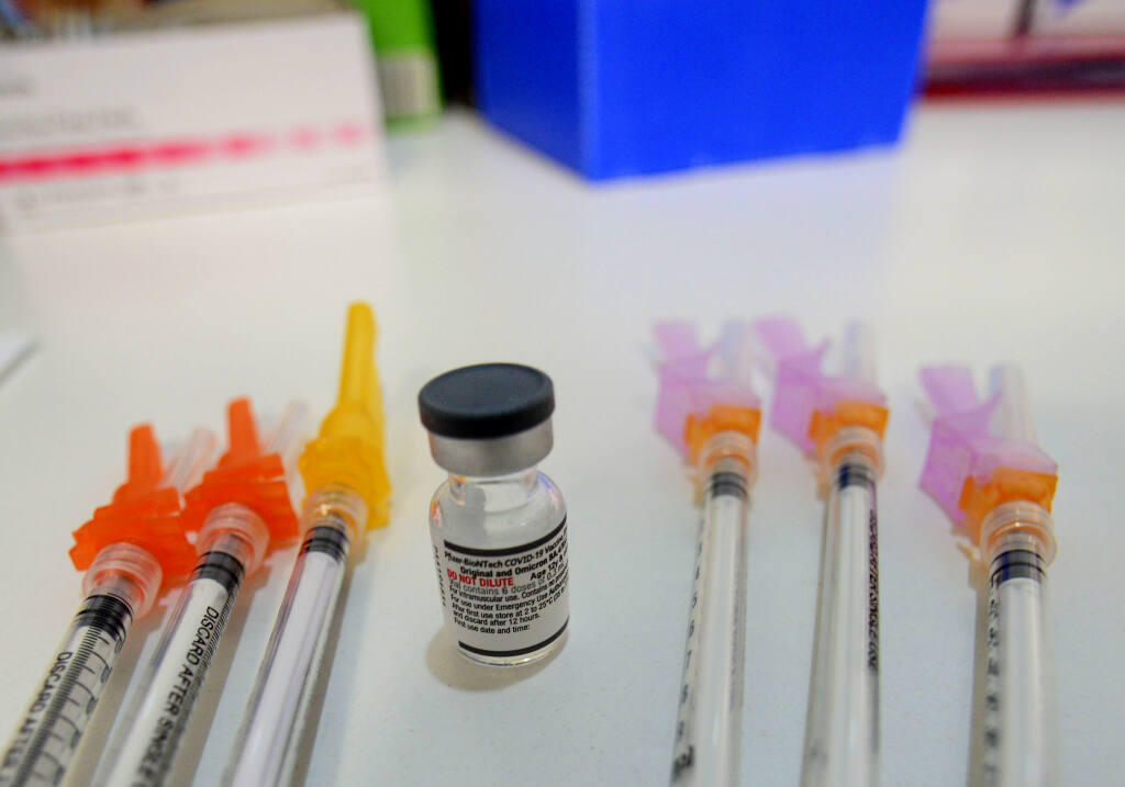 Booster shots of the Pfizer COVID-19 vaccine could help against a fall and winter surge of the latest subvariant, authorities say. (Kristopher Radder/The Brattleboro Reformer via AP)
