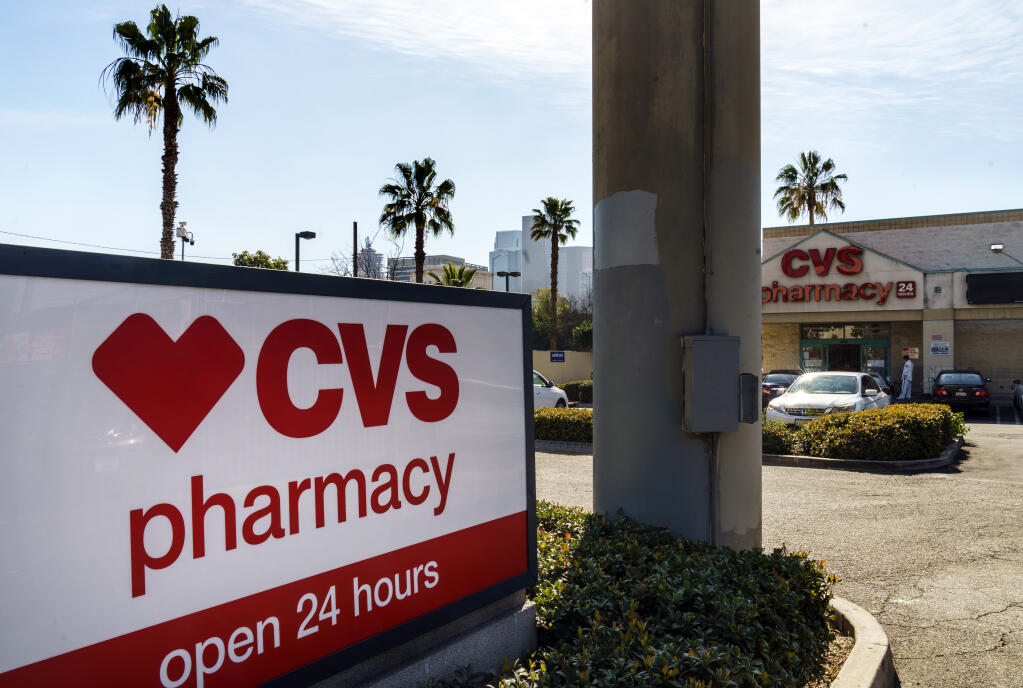 A CVS pharmacy is seen in Los Angeles Wednesday, Feb. 3, 2021. (AP Photo/Damian Dovarganes)