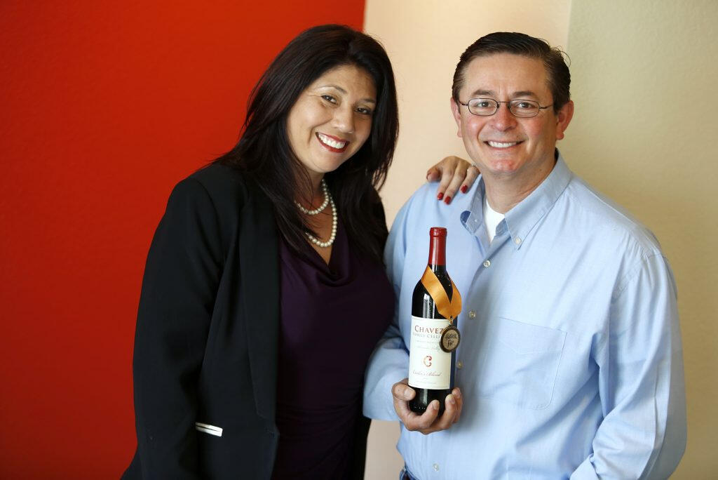 Linda and Carlos Chavez of Chavez Family Cellars at their offices in Healdsburg, Thursday, March 6, 2014. (Beth Schlanker / The Press Democrat file)
