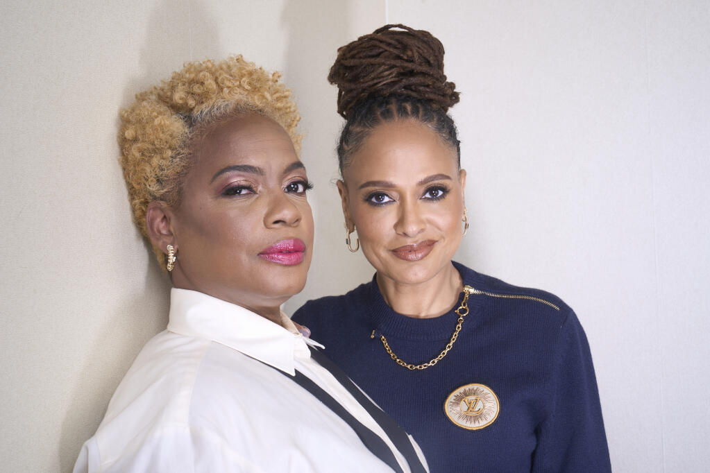 Aunjanue Ellis-Taylor, left, and director Ava DuVernay pose for a portrait to promote the film "Origin" on Tuesday, Dec. 5, 2023, in Beverly Hills, Calif. (AP Photo/Damian Dovarganes)