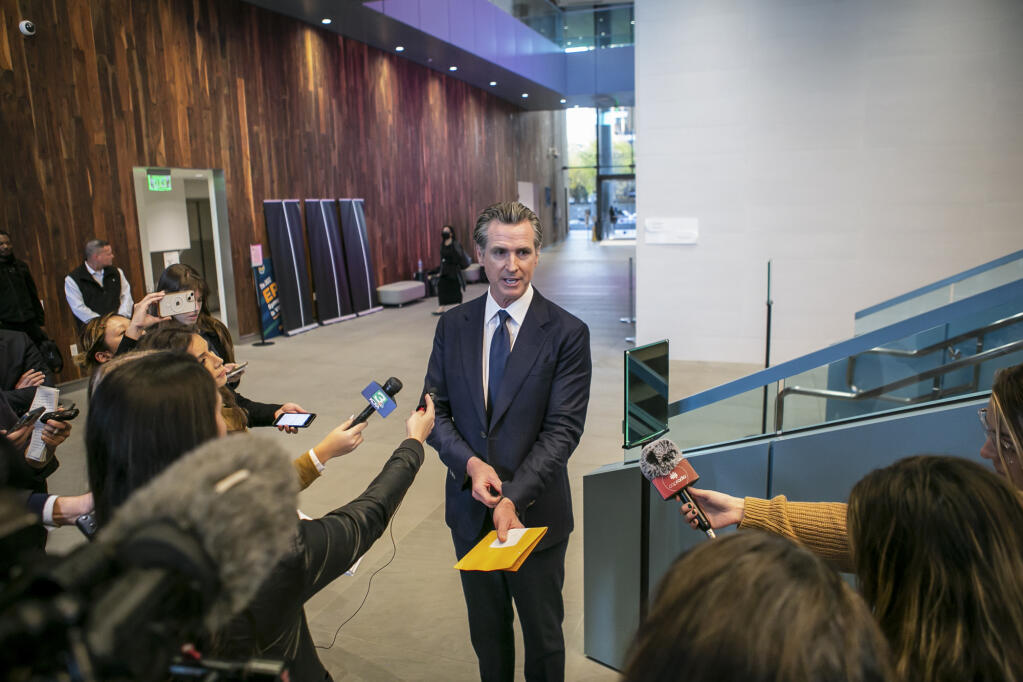 Gov. Gavin Newsom addresses the media after a meeting with local leaders on homelessness in Sacramento on Nov. 18, 2022. Photo by Rahul Lal, CalMatters