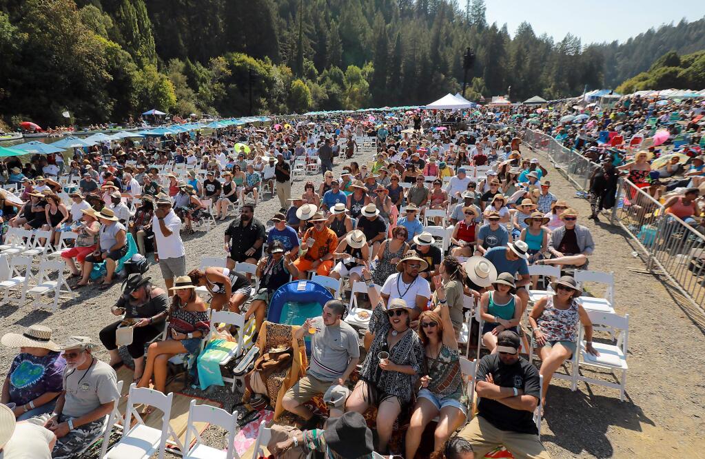The crowd danced in the sand at Johnson's Beach in Guerneville at the Russian River Jazz & Blues Festival on Saturday. (John Burgess/The Press Democrat)
