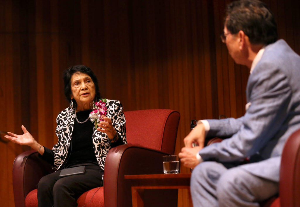 Dolores Huerta, the co-founder of the United Farm Workers of America with Cesar Chavez, joined by President Frank Chong speaks to a crowd at Santa Rosa Junior College in Santa Rosa on Monday, April 22, 2019. (BETH SCHLANKER/ The Press Democrat)