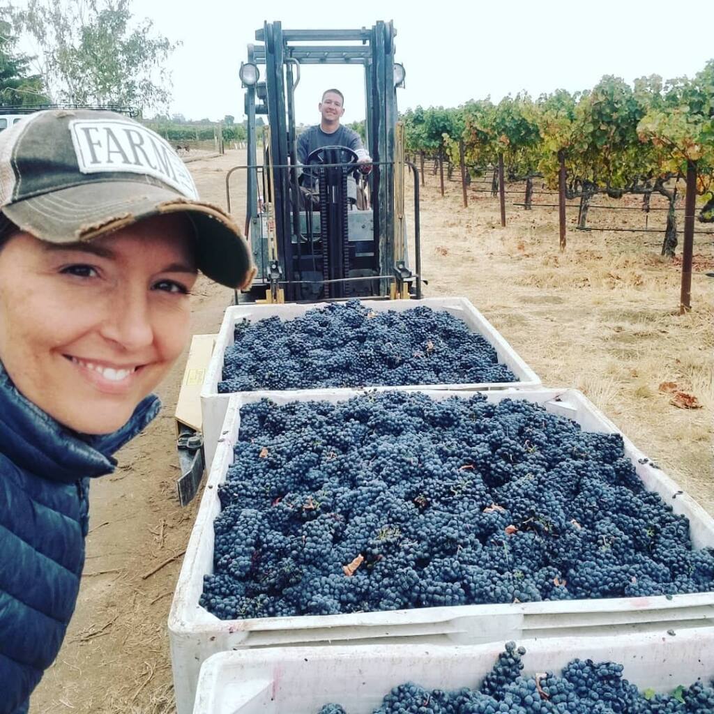 Lisa Howard with her husband, Cliff, on the forklift. The couple owns Tolenas Winery in west Solano County’s Suisun Valley appellation. She left a job as an agricultural engineer and eventually the couple moved into wine making.  (courtesy of Tolenas Winery)