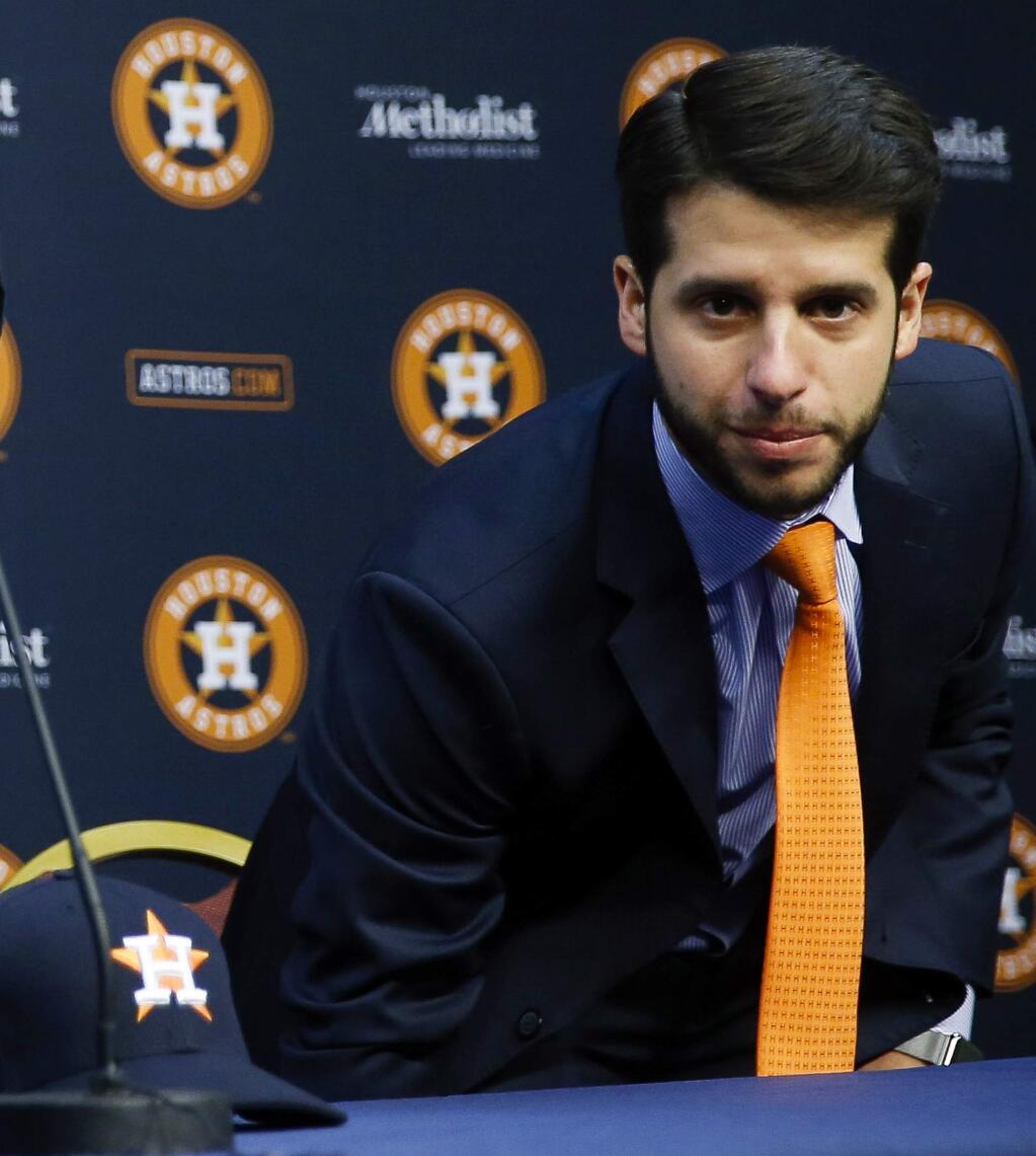 FILE - In this Jan. 17, 2018, file photo, Houston Astros Senior Director of Baseball Operations Brandon Taubman attends a baseball news conference in Houston. The Astros have fired Taubman for directing inappropriate comments at female reporters following Houston's pennant-winning victory over the New York Yankees. (Michael Ciaglo/Houston Chronicle via AP)