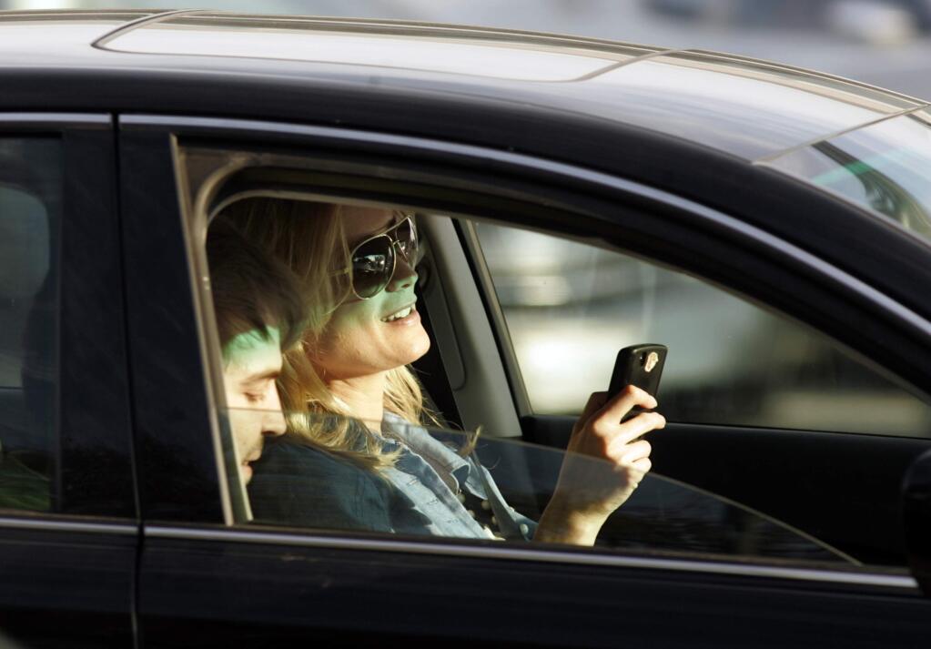 Distracted-driving accidents caused 3,500 fatalities and close to 400,000 injuries in 2015. (MEL MELCON / Los Angeles Times)