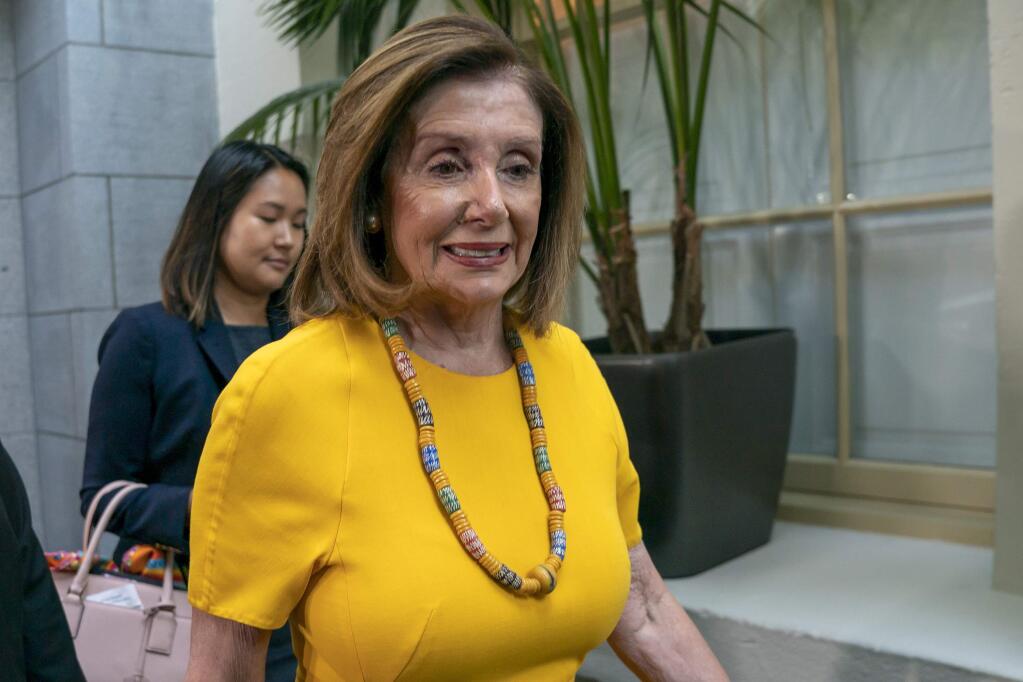 Speaker of the House Nancy Pelosi, D-Calif., arrives for a gathering of the House Democratic Caucus at the Capitol in Washington, Tuesday, Sept. 10, 2019. A leaked draft proposal from Pelosi says Medicare should overhaul how it pays for prescription drugs, by negotiating prices for the costliest medications, curbing year-to-year price hikes, and limiting what seniors pay out of their own pockets. (AP Photo/J. Scott Applewhite)