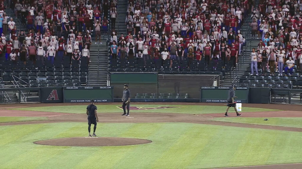 This image provided by Fox Sports shows a screen shot from video showing a test of the virtual crowds at Chase Field in Phoenix, in early July 2020. Fox Sports has revealed that it will include computer-generated fans beginning with their three Major League Baseball games on Saturday, July 25. (Fox Sports via AP)