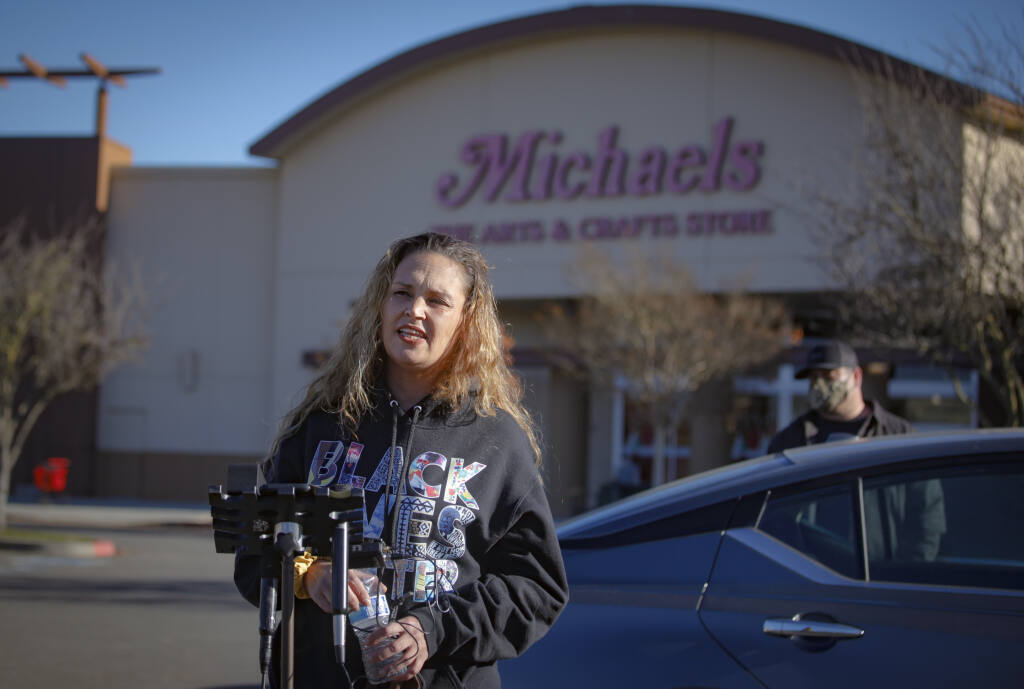 Sadie Martinez speaks at a news conference Friday, Dec. 18, 2020, outside a Michaels store in Petaluma where she and her husband, Eddie, were identified as suspects in an attempted kidnapping by Instagram influencer, Katie Sorensen. Police found no evidence of a crime and the Martinezes believe it to be a case of racial profiling. (Crissy Pascual / Argus-Courier)