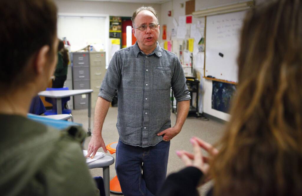 Petaluma, CA, USA. Monday, March 07, 2017._ Todd Siders is a social studies teacher at Casa Grande HS where he teaches 'PEACE' (philosophy, ethics and community engagement). To make ends meet, the 48-year-old divorced teacher and father has to juggle several other part-time jobs including being a driver for Lyft. (CRISSY PASCUAL/ARGUS-COURIER STAFF)