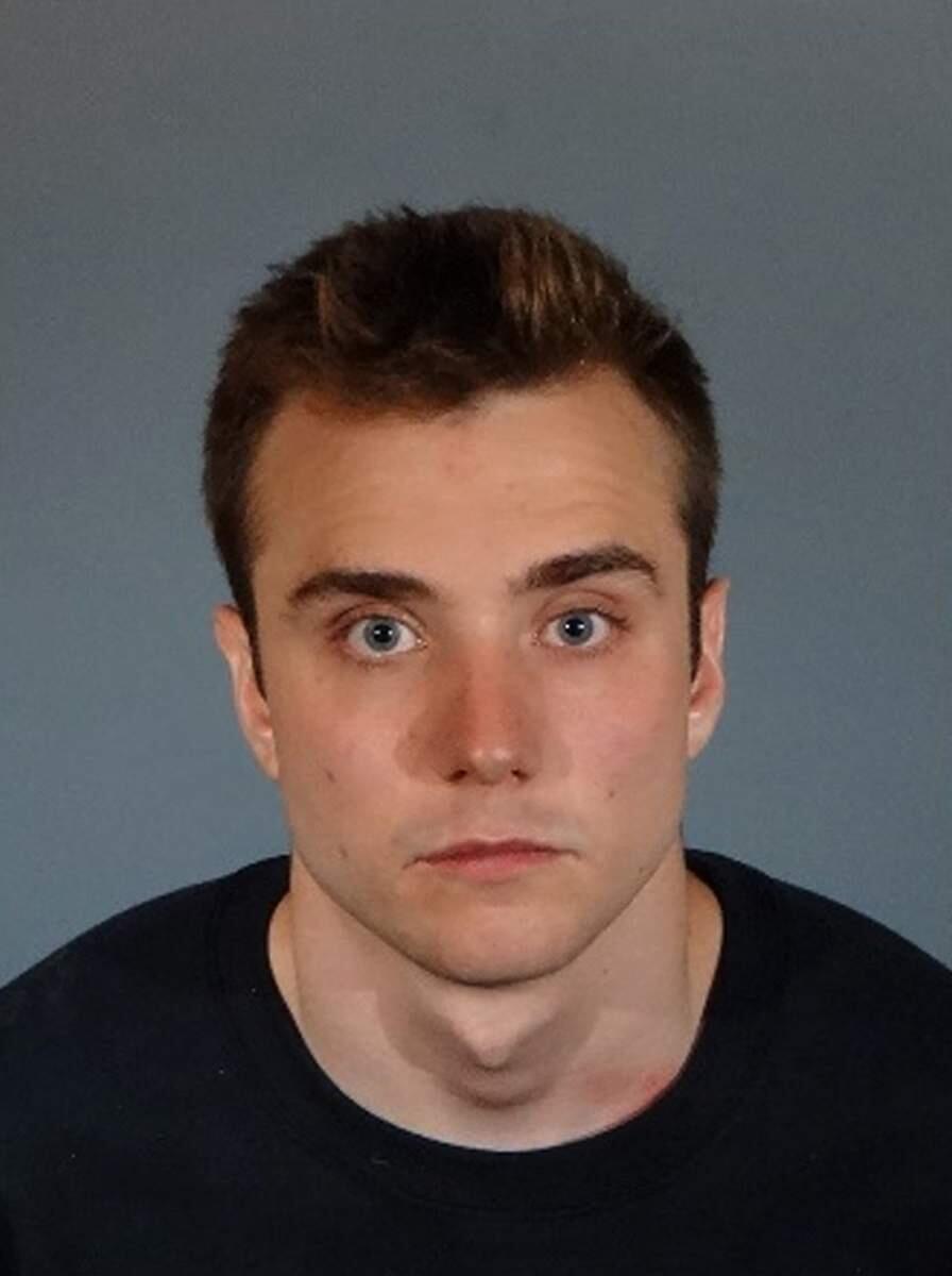 This Wednesday, June 29, 2016, photo released by Los Angeles County Sheriff's Department shows Calum McSwiggan. The London-native gay YouTube personality who said he was assaulted outside a West Hollywood club has been charged with filing a false police report and faking his injuries. (Los Angeles County Sheriff's Department via AP)