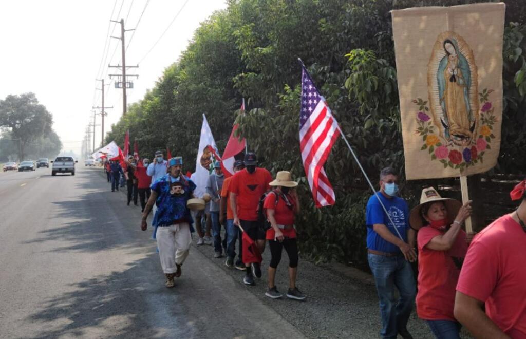 Marchers head to the French Laundry in Yountville on Wednesday, Sept. 22, 2021,  after Gov. Newsom vetoed a bill that would have allowed farm workers to vote by mail in union elections. (United Farm Workers / Twitter)