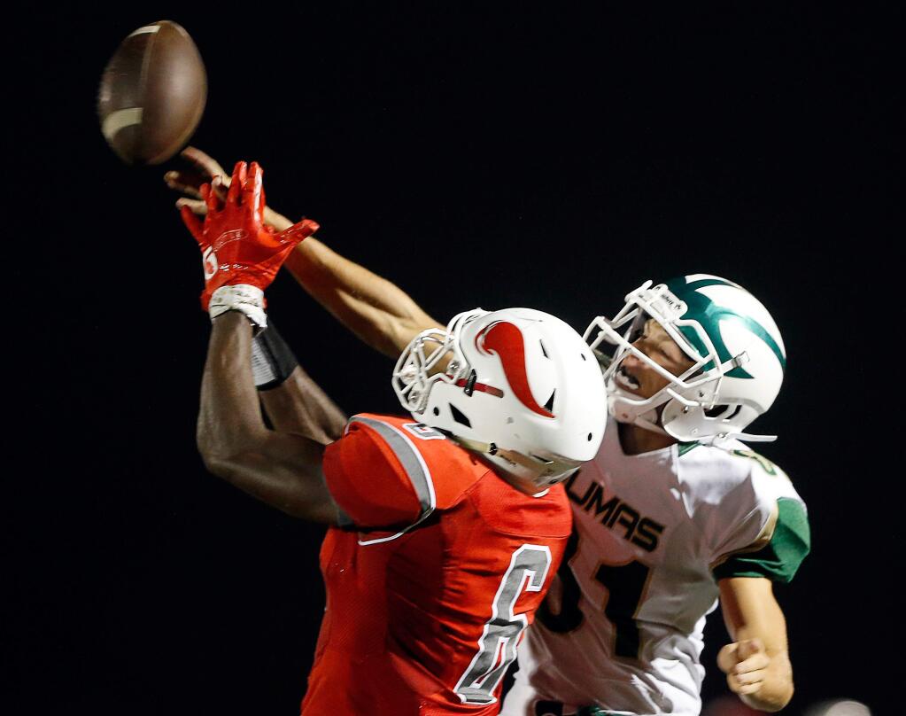 Maria Carrillo defensive back Mason Adams (81), right, knocks the ball away from Montgomery wide receiver BJ Johnson (6) during the first half of a varsity football game between Maria Carrillo and Montgomery high schools, in Santa Rosa, California, on Friday, September 21, 2018. (Alvin Jornada / The Press Democrat)