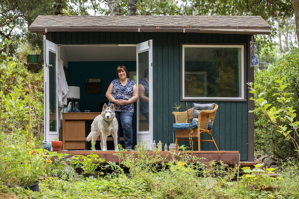 Writer Rita Sever works in a tiny cottage in the backyard of her Forestville home. Sever just published "Leading for Justice: Supervision, HR and Culture" to help leaders create a more just organization. (Photo by John Burgess/The Press Democrat)