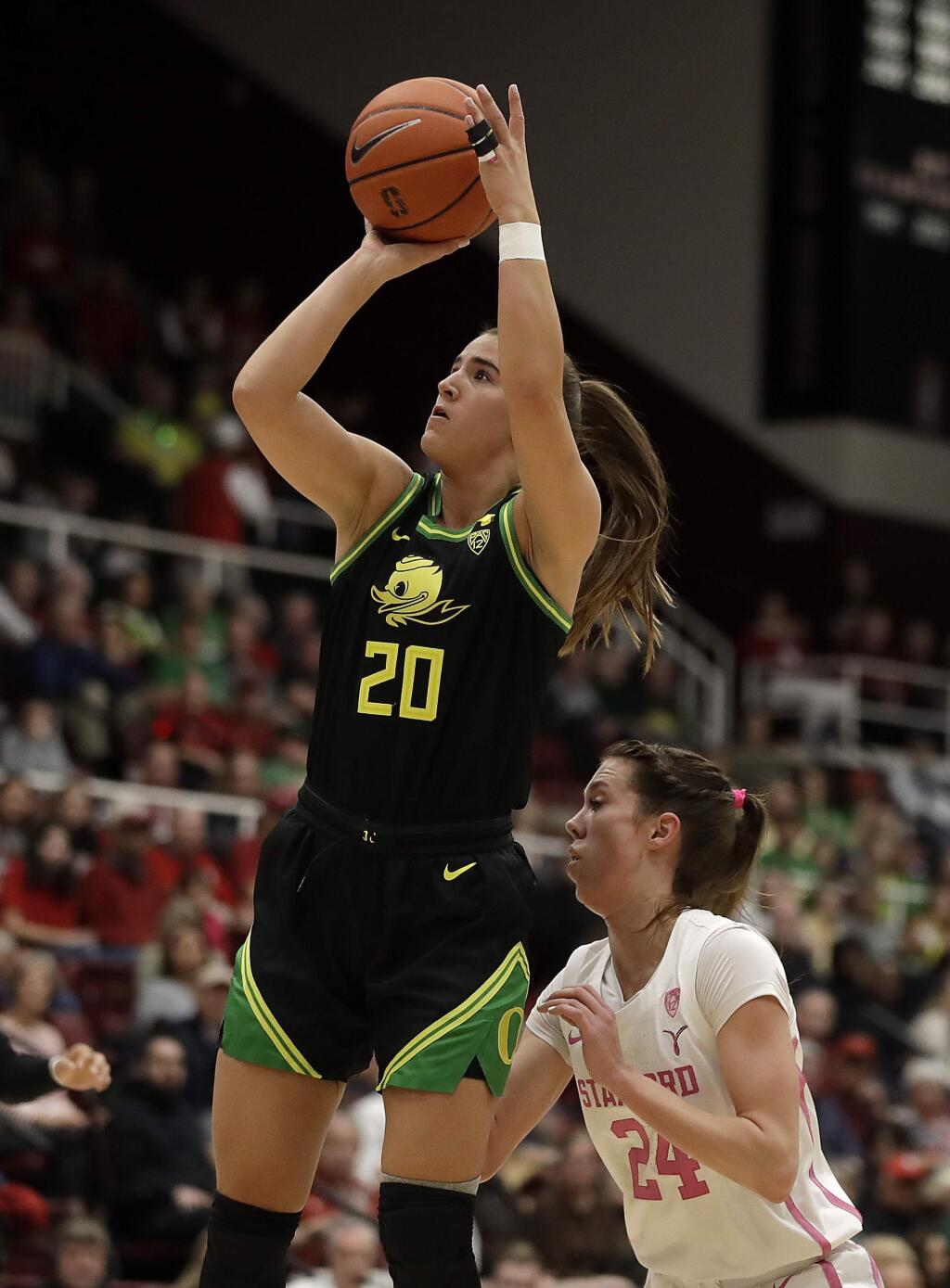Oregon Ducks guard Sabrina Ionescu (20) shoots over Stanford's Lacie Hull, right, during the first half of an NCAA college basketball game Monday, Feb. 24, 2020, in Stanford, Calif. (AP Photo/Ben Margot)
