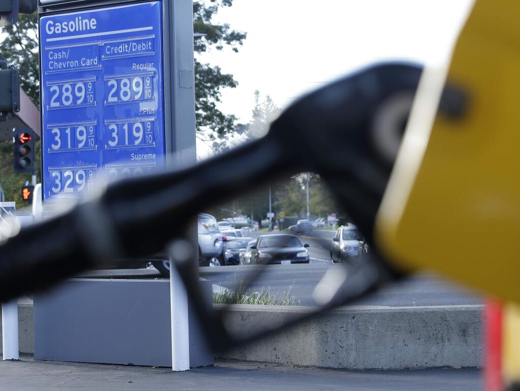 A state commission studying gasoline prices in California found a 'mystery surcharge' of about 22 cents a gallon. (RICH PEDRONCELLI / Associated Press)