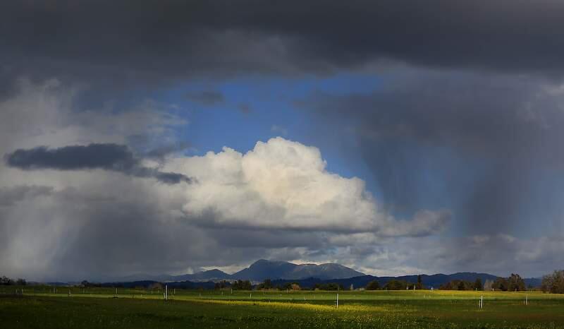 (FILE PHOTO) Hailstorms and rain showers roll over the Santa Rosa Plain with Mount St. Helena in the background, Tuesday Feb. 19, 2013. (Kent Porter / Press Democrat) 2013