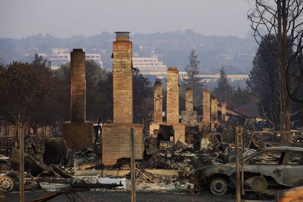 A row of chimneys left standing in a Santa Rosa neighborhood devastated by the Tubbs fire. (JAE C. HONG / Associated Press, 2017)