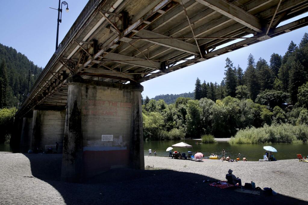 The rusted steel and aging concrete can be seen on the underside of the Bohemian Highway Bridge over the Russian River in Monte Rio, Monday, June 27, 2016. (Beth Schlanker / The Press Democrat file)