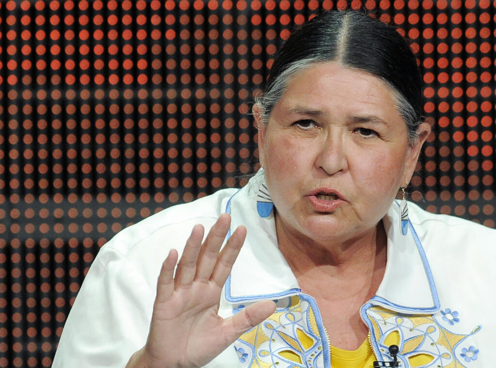 FILE - Activist and actress Sacheen Littlefeather takes part in a panel discussion on the PBS special "Reel Injun" at the PBS Television Critics Association summer press tour in Beverly Hills, Calif., Thursday, Aug. 5, 2010. Sacheen Littlefeather, the Native American activist who declined Marlon Brando’s 1973 Academy Award for “The Godfather” on his behalf in an indelible protest of how Native Americans had been portrayed on screen, died Sunday, Oct. 2, 2022, at her home in Marin County, Calif. She was 75. (AP Photo/Chris Pizzello, FIle)