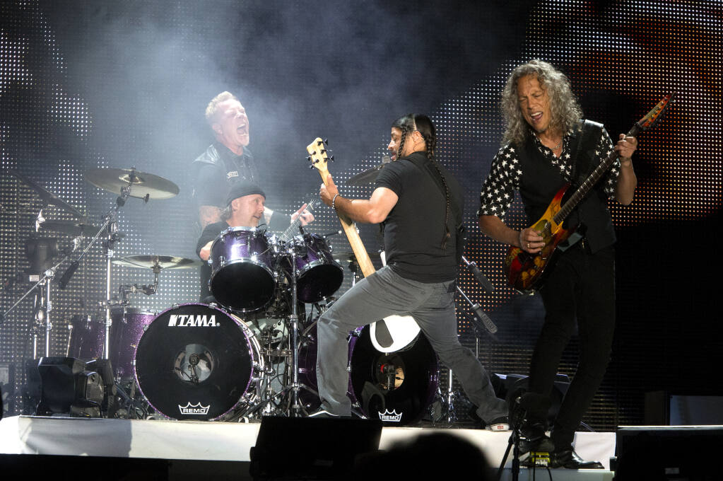 From left, James Hetfield, drummer Lars Ulrich, Robert Trujillo and Kirk Hammett of the band Metallica perform in concert in 2017. Photos were not allowed at the Aug. 10 concert filming in Sonoma. (Photo by Owen Sweeney/Invision/AP)