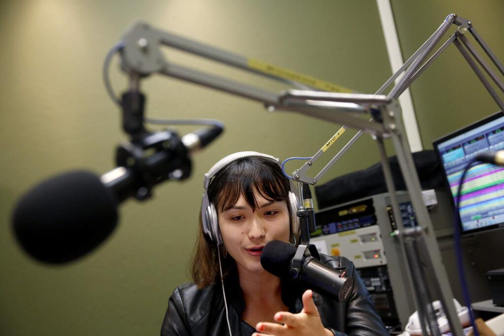 Kaiya Kramer hosts The Queer Life radio show at the KBBF - FM 89.1 studio in Santa Rosa, on Friday, December 18, 2015. (BETH SCHLANKER/ The Press Democrat)