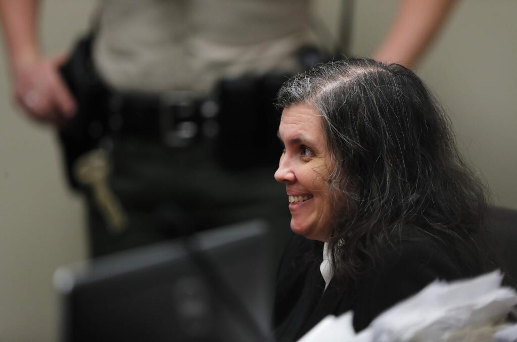 Louise Turpin appears in court in Riverside, Calif., Wednesday, Jan. 24, 2018. Louise and David Turpin are accused of abusing their 13 children - ranging from 2 to 29 - before they were rescued on Jan. 14 from their home in Perris. They have pleaded not guilty to torture and other charges. (Mike Blake/Pool Photo via AP)