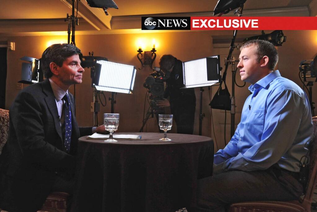 In this photo provided by ABC News, ABC News' chief anchor George Stephanopoulos, left, interviews Ferguson, MO., police officer Darren Wilson, Tuesday, Nov. 25, 2014 in Missouri. The interview will air during ABC News programs and platforms on Nov. 25 and 26. (AP Photo/ABC News, Kevin Lowder)