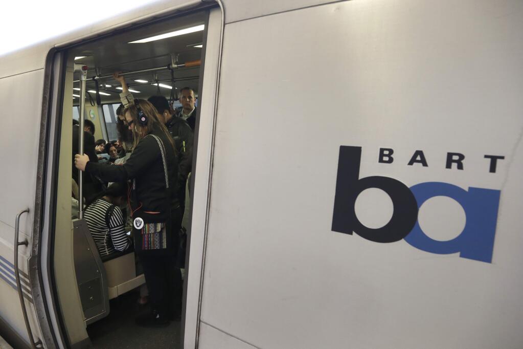 BART police says a group of 40-60 juveniles boarded a train in Oakland on Saturday and robbed the passengers. Police refused to release security video, citing privacy concerns for the offenders. (BEN MARGOT / Associated Press)
