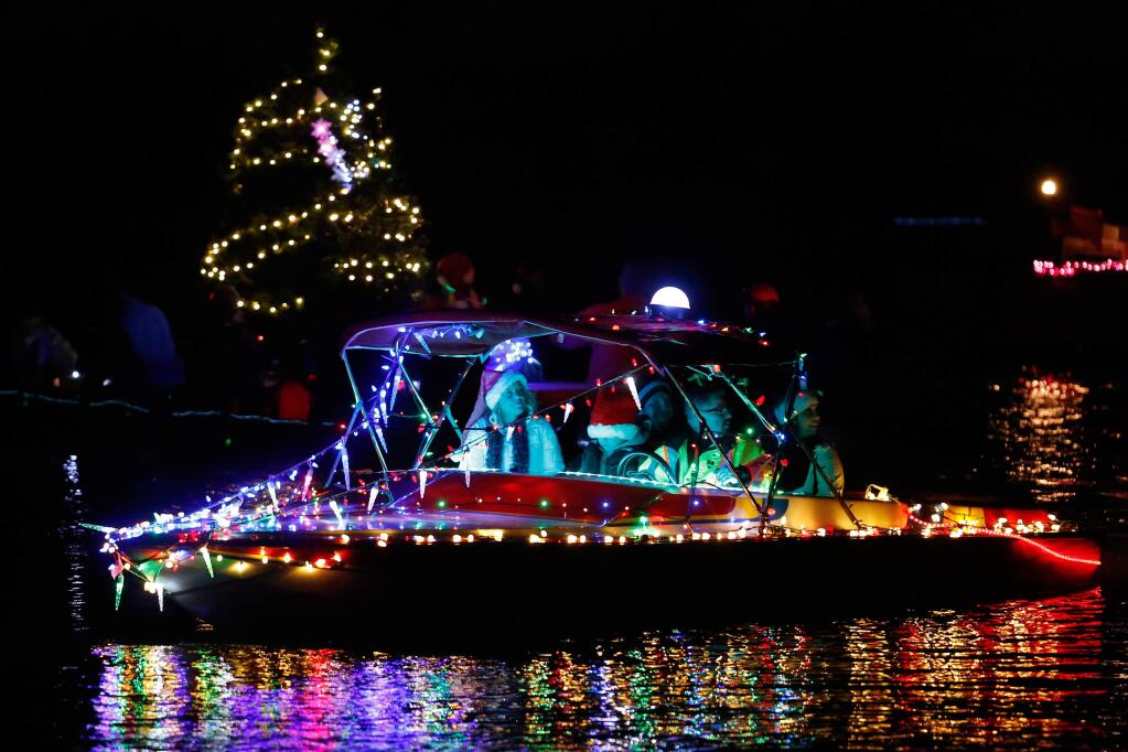 The Lighted Boat Parade in Petaluma, California on Saturday, December 5, 2015. (Alvin Jornada / The Press Democrat)