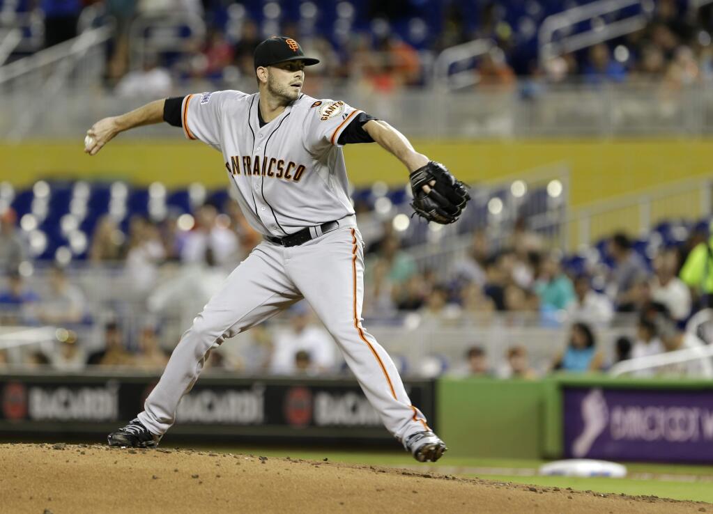 San Francisco Giants' Chris Heston delivers a pitch during the first inning of a baseball game against the Miami Marlins, Wednesday, July 1, 2015, in Miami. (AP Photo/Wilfredo Lee)