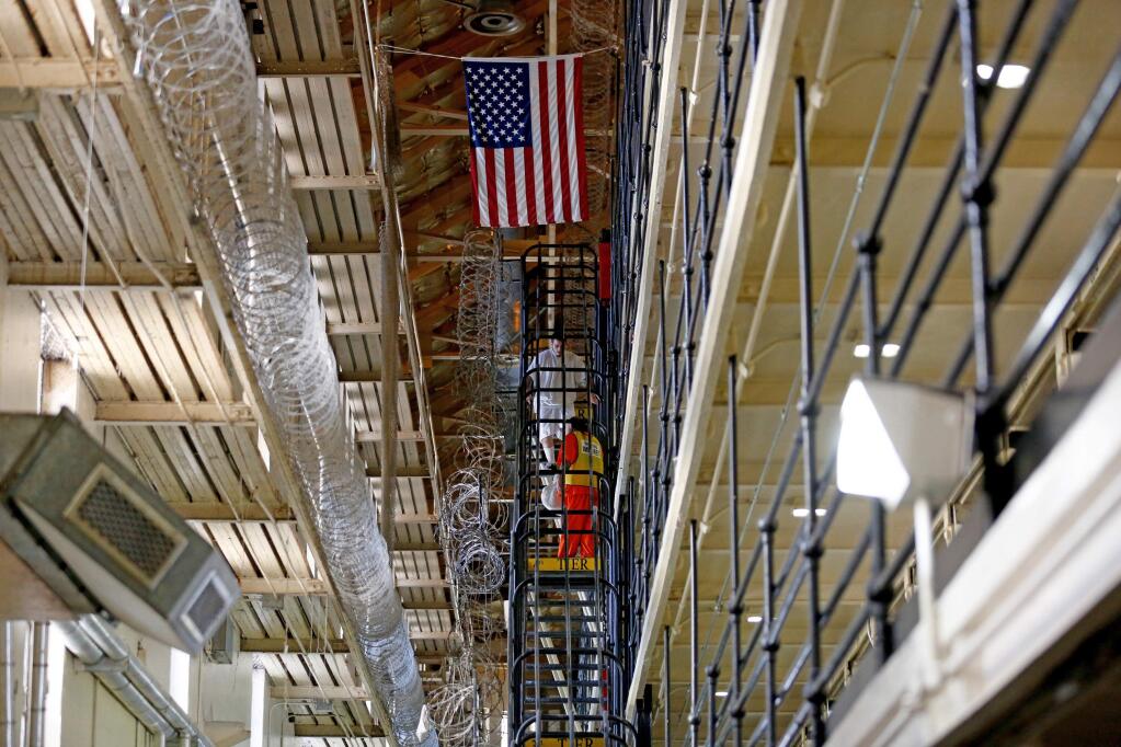East Block at San Quentin State Prison. A legal clash is brewing over a 2016 constitutional amendment allowing inmates to earn early release and a initiative adding limits that qualified for the 2020 ballot. (GARY CORONADO / Los Angeles Times)