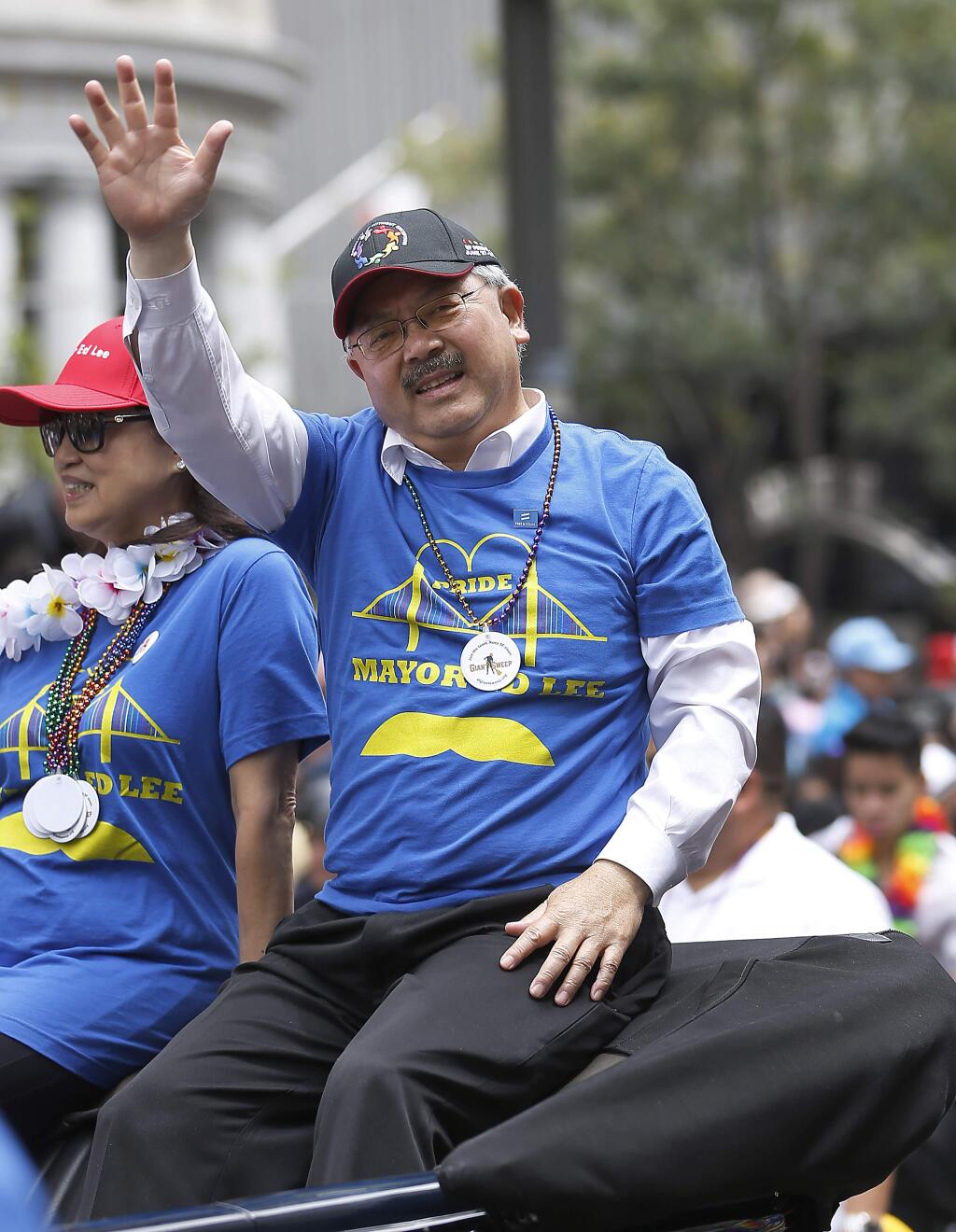 San Francisco Mayor Ed Lee waves during the 45th annual San Francisco Gay Pride parade Sunday, June 28, 2015, in San Francisco. A large turnout was expected for gay pride parades across the U.S. following the landmark Supreme Court ruling that said gay couples can marry anywhere in the country. (AP Photo/ Tony Avelar)