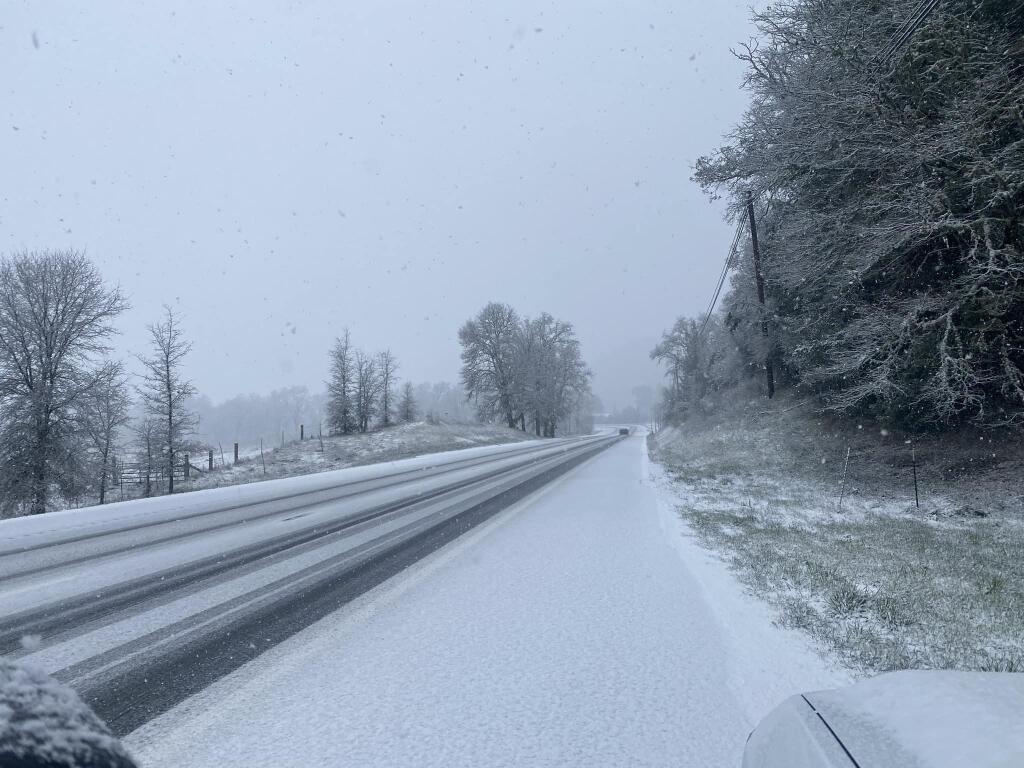 Mendocino County Sheriff Matt Kendall took this photo of snow on the road in the Laytonville and Leggett area Tuesday, Feb. 14, 2023. (Mendocino County Sheriff/Facebook)