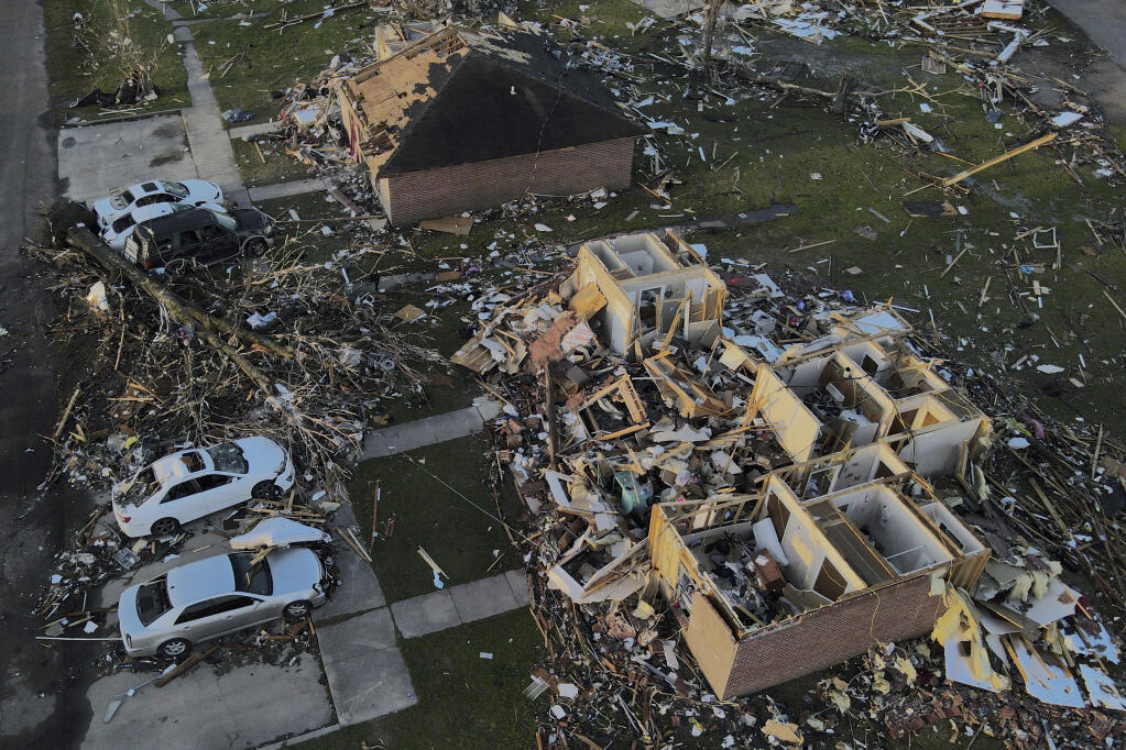 Damage is seen on properties in Rolling Fork, Miss., where three days earlier a tornado ripped through the town, Monday, March 27, 2023, in Rolling Fork, Miss. (AP Photo/Julio Cortez)
