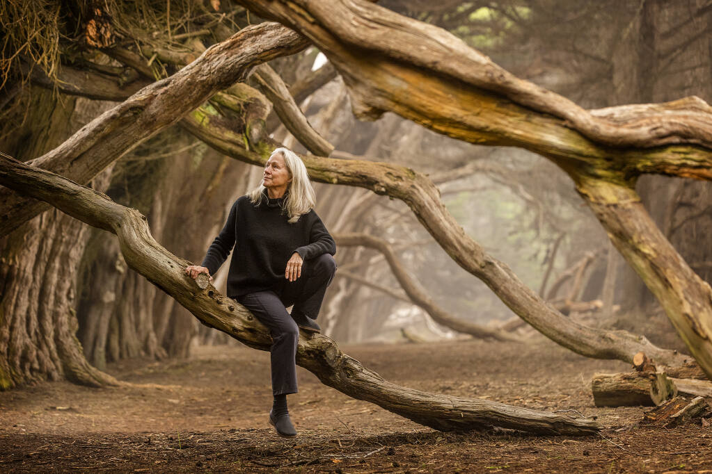 Kathryn Arnold, the founder of the Yoga Journal and Wild Hope magazines, photographed in a hedgerow near her Sea Ranch home on Tuesday, Nov. 17, 2021. (John Burgess/The Press Democrat)