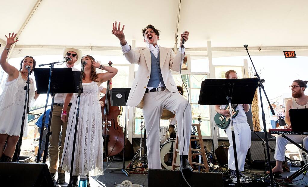 The Crux, with Josh Windmiller in white suit, at the Rivertown Revival, 2018. (PHILIP PAVLIGER/COURTESY OF FRIENDS OF THE PETALUMA RIVER)