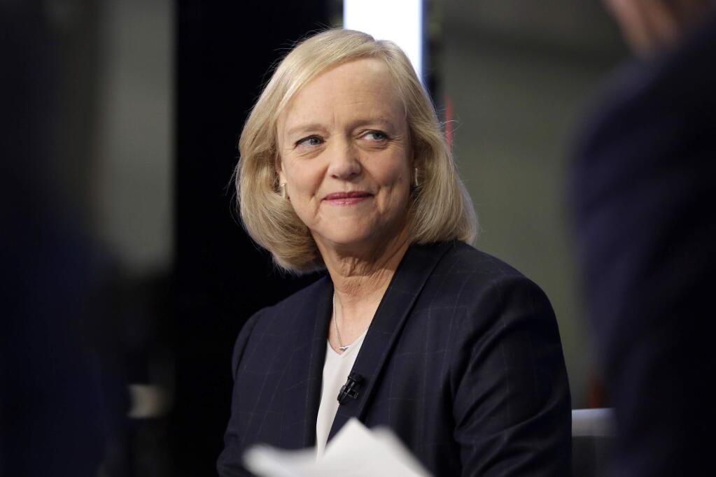 In this Nov. 2, 2015 photo, Hewlett Packard Enterprise President and CEO Meg Whitman is interviewed on the floor of the New York Stock Exchange. Whitman is stepping down as the CEO of Hewlett Packard Enterprise. She'll be replaced by Antonio Neri, the company's president. (AP Photo/Richard Drew)