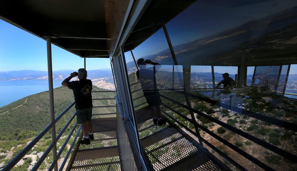 Mark Meredith, left, and Ric Abrams begin their shift at the Mt. Konocti fire lookout above Kelseyville, Thursday July 20, 2017. (Kent Porter / Press Democrat) 2017
