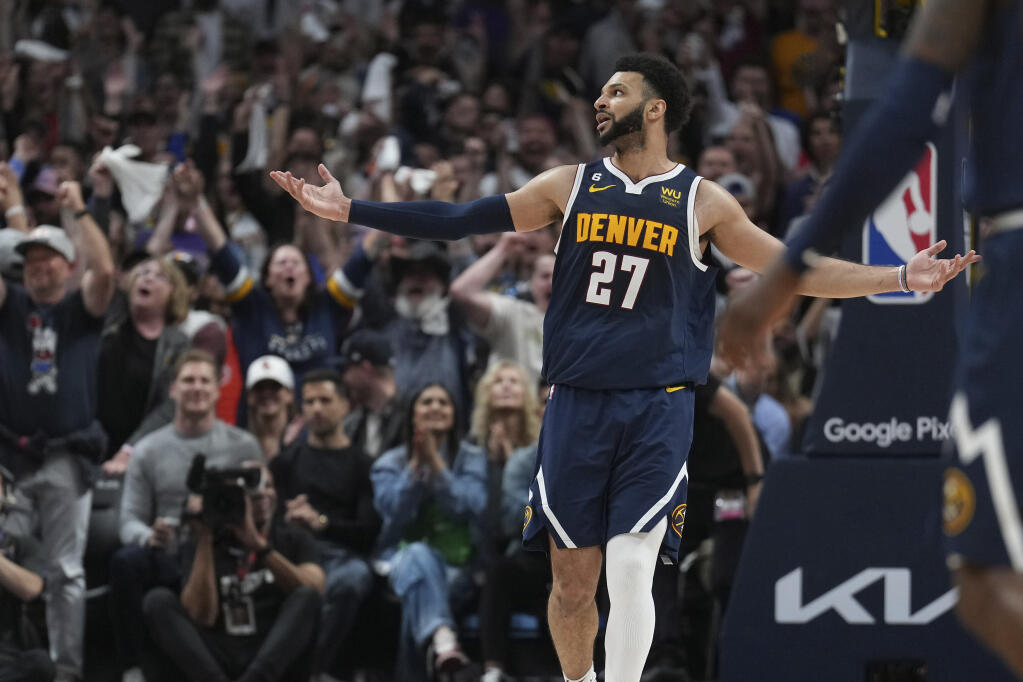 Nuggets guard Jamal Murray celebrates a three-pointer against the Los Angeles Lakers during the second half of Game 2 of the NBA Western Conference Finals series, Thursday, May 18, 2023, in Denver. (Jack Dempsey / ASSOCIATED PRESS)