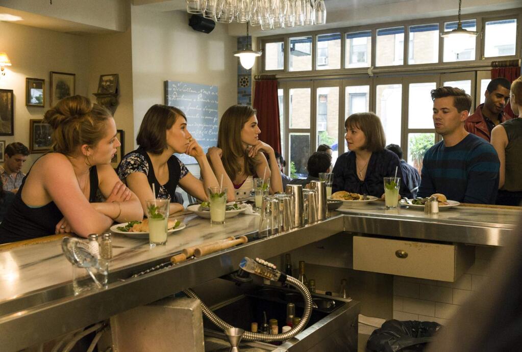 This photo released by HBO shows, from left, Jemina Kirke, Zosia Mamet, Allison Williams, Lena Dunham, and Andrew Rannells, in a scene from season 4 of 'Girls.' (AP Photo/HBO, Jessica Miglio)